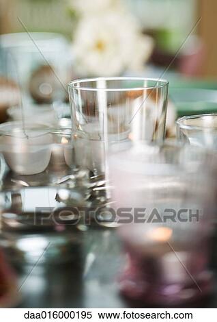 Glasses on table View Large Photo Image Stock Photography - Glasses on table. Fotosearch