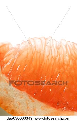 Grapefruit slice, extreme close-up View Large Photo Image Stock Photo - Grapefruit slice, extreme close-up. Fotosearch