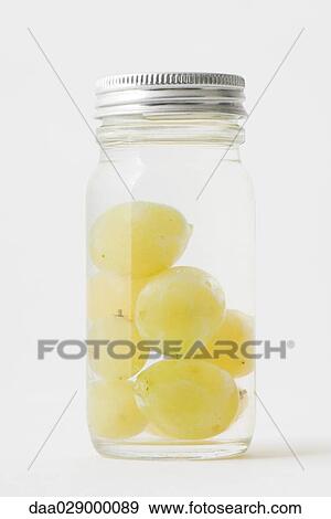 Stock Photo - Grapes in small container. Fotosearch