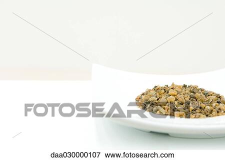 Gravel on dish, close-up View Large Photo Image Stock Photo - Gravel on dish, close-up. Fotosearch