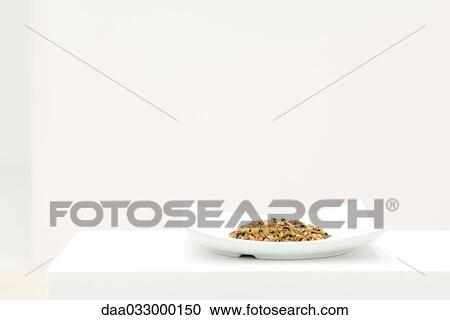 Stock Image - Gravel on dish. Fotosearch