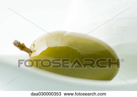 Green olive, close-up View Large Photo Image Stock Image - Green olive, close-up. Fotosearch