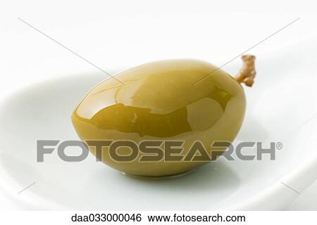 Green olive in small dish View Large Photo Image Stock Photograph - Green olive in small dish. Fotosearch