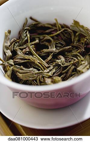 Green tea leaves View Large Photo Image Stock Image - Green tea leaves. Fotosearch