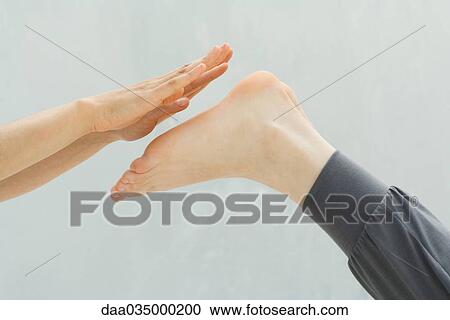 Hands prepared to massage feet, close-up View Large Photo Image Stock Image - Hands prepared to massage feet, close-up. Fotosearch