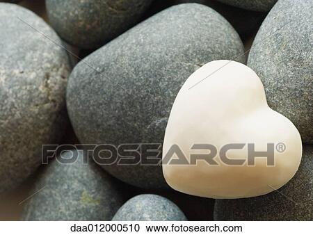 Heart shape on stones View Large Photo Image Stock Image - Heart shape on stones. Fotosearch