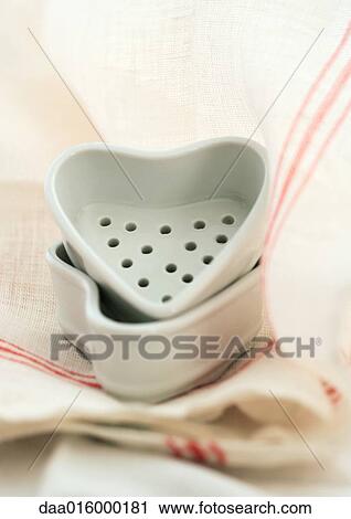 Stock Image - Heart-shaped dishes. Fotosearch