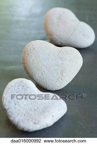 Heart-shaped stones View Large Photo Image Stock Image - Heart-shaped stones. Fotosearch
