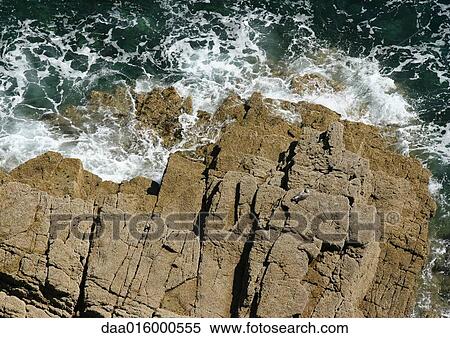 Stock Photography - Ile de Brehat, Brittany, France, coastal rock formations, high angle view. Fotosearch