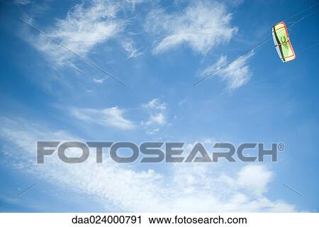 Kite in sky, low angle view View Large Photo Image Stock Image - Kite in sky, low angle view. Fotosearch