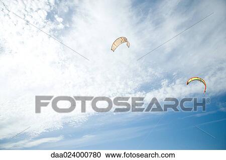 Kites in sky, low angle view View Large Photo Image Stock Image - Kites in sky, low angle view. Fotosearch