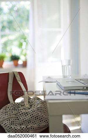 Laptop computer on desk in home office View Large Photo Image Stock Image - Laptop computer on desk in home office. Fotosearch