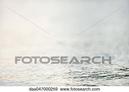 Light refracted on rippling water View Large Photo Image Stock Photo - Light refracted on rippling water. Fotosearch