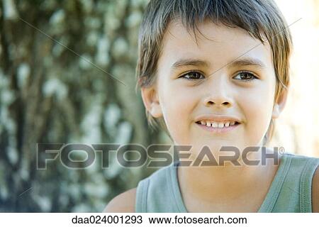 Little boy outdoors, smiling, head and shoulders, portrait View Large Photo Image Stock Image - Little boy outdoors, smiling, head and shoulders, portrait. Fotosearch