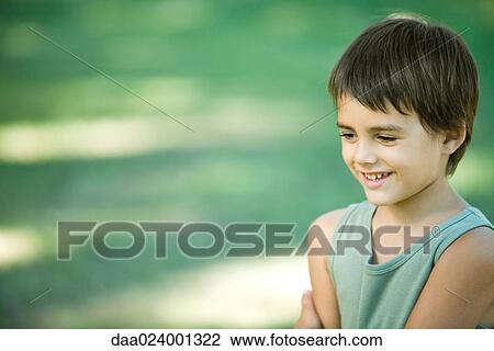 Little boy outdoors, smiling, head and shoulders View Large Photo Image Stock Image - Little boy outdoors, smiling, head and shoulders. Fotosearch