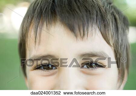 Little boy smiling at camera, cropped view of face, close-up View Large Photo Image Stock Image - Little boy smiling at camera, cropped view of face, close-up. Fotosearch