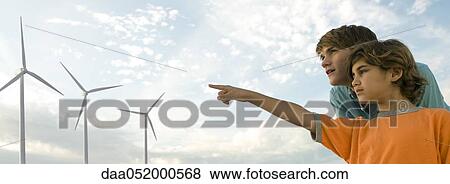 Looking at wind turbines View Large Photo Image Stock Photo - Looking at wind turbines. Fotosearch