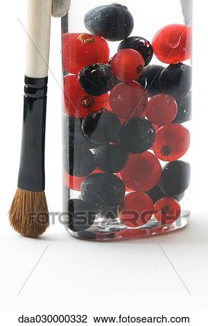 Make-up brush next to cosmetic jar filled with red and black currants View Large Photo Image Stock Image - Make-up brush next to cosmetic jar filled with red and black currants. Fotosearch