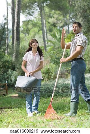 Man and teenage girl doing yard work View Large Photo Image Stock Photo - Man and teenage girl doing yard work. Fotosearch