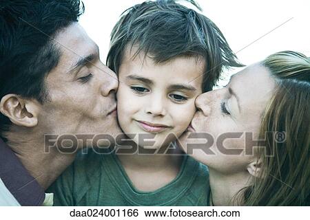 Man and woman kissing son on cheeks, close-up View Large Photo Image Stock Photograph - Man and woman kissing son on cheeks, close-up. Fotosearch