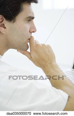 Man holding chin, profile View Large Photo Image Stock Image - Man holding chin, profile. Fotosearch