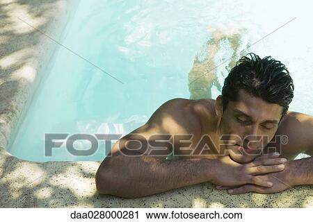 Man holding on to edge of swimming pool, head resting on arms, eyes closed View Large Photo Image Stock Image - Man holding on to edge of swimming pool, head resting on arms, eyes closed. Fotosearch