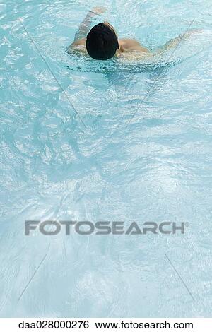 Man in swimming pool, rear view, high angle View Large Photo Image Stock Photograph - Man in swimming pool, rear view, high angle. Fotosearch