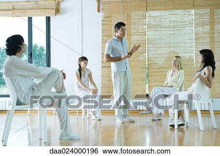 Man leading group therapy session View Large Photo Image Stock Photograph - Man leading group therapy session. Fotosearch