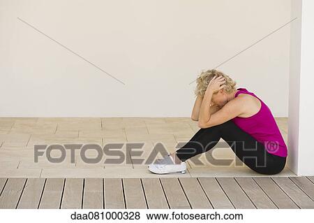 Mature woman exercising indoors View Large Photo Image Stock Photo - Mature woman exercising indoors. Fotosearch