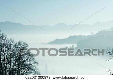 Misty mountain landscape View Large Photo Image Stock Image - Misty mountain landscape. Fotosearch