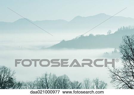 Misty mountain landscape View Large Photo Image Stock Photo - Misty mountain landscape. Fotosearch