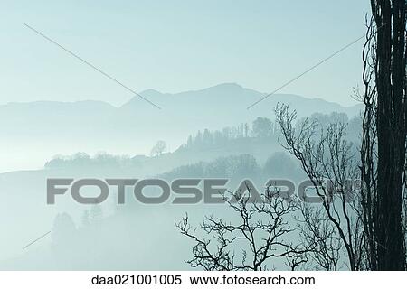 Stock Photography - Misty mountain landscape. Fotosearch