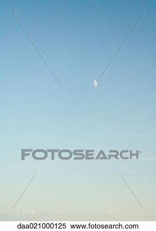 Stock Photography - Moon in blue sky. Fotosearch
