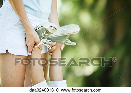 Mother and son, woman holding boy's feet upside down, cropped View Large Photo Image Stock Image - Mother and son, woman holding boy's feet upside down, cropped. Fotosearch