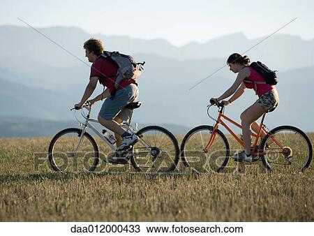 Stock Image - Mountain bikers. Fotosearch