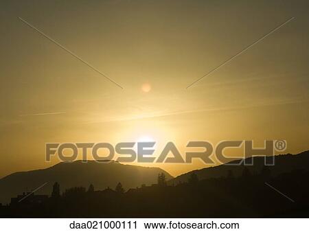 Stock Image - Mountain landscape at sunset. Fotosearch