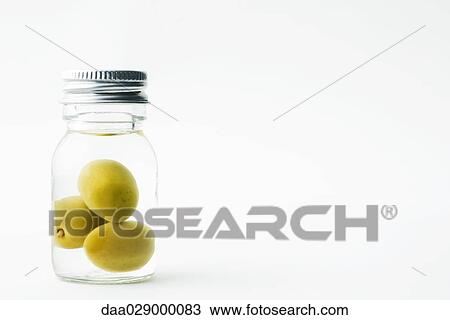 Olives in small bottle View Large Photo Image Stock Image - Olives in small bottle. Fotosearch
