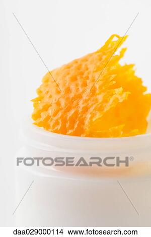 Orange rind in cosmetic jar, close-up View Large Photo Image Picture - Orange rind in cosmetic jar, close-up. Fotosearch