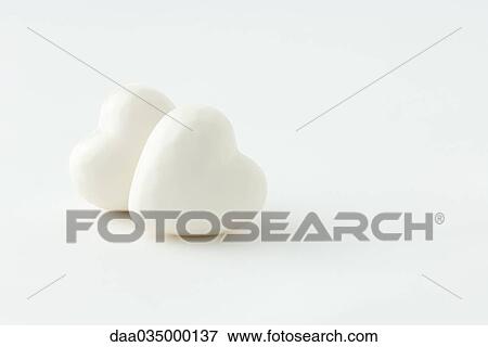 Pair of heart-shaped objects View Large Photo Image Stock Photo - Pair of heart-shaped objects. Fotosearch