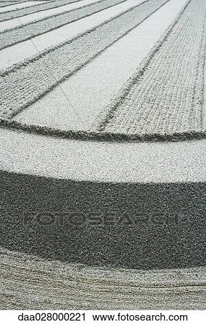 Patterns raked in gravel, close-up View Large Photo Image Stock Image - Patterns raked in gravel, close-up. Fotosearch