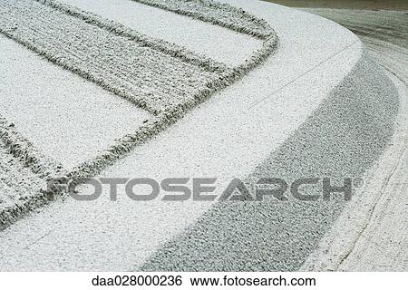 Patterns raked in gravel, close-up View Large Photo Image Stock Photograph - Patterns raked in gravel, close-up. Fotosearch