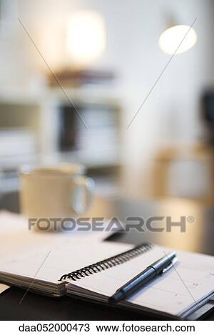 Pen resting on open agenda View Large Photo Image Stock Image - Pen resting on open agenda. Fotosearch