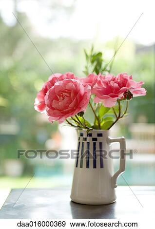 Peonies in vase View Large Photo Image Stock Photo - Peonies in vase. Fotosearch