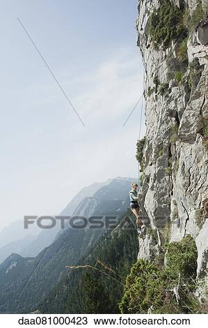 Preteen girl rock climbing View Large Photo Image Stock Image - Preteen girl rock climbing. Fotosearch