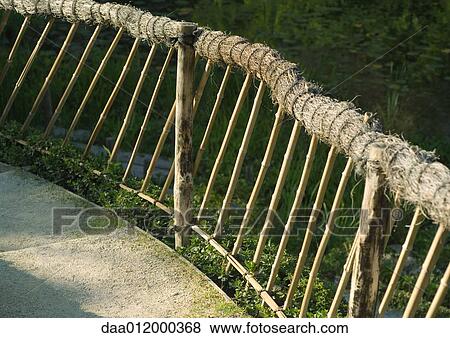 Railing next to footpath View Large Photo Image Stock Photo - Railing next to footpath. Fotosearch