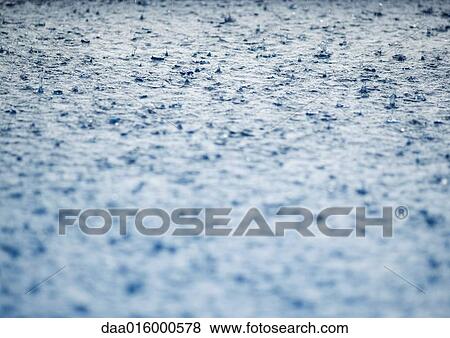 Rain falling on surface of water View Large Photo Image Stock Photo - Rain falling on surface of water. Fotosearch