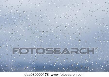 Raindrops on window, close-up View Large Photo Image Stock Photo - Raindrops on window, close-up. Fotosearch