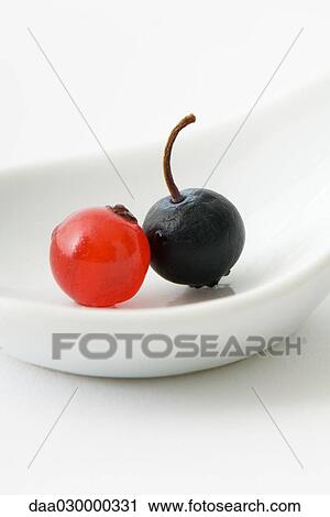 Red currant and black currant on spoon, close-up View Large Photo Image Stock Image - Red currant and black currant on spoon, close-up. Fotosearch