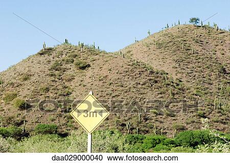 Road sign in arid landscape View Large Photo Image Stock Image - Road sign in arid landscape. Fotosearch