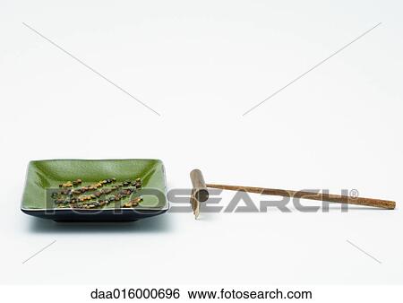 Rows of seeds in dish, with rake View Large Photo Image Stock Photograph - Rows of seeds in dish, with rake. Fotosearch